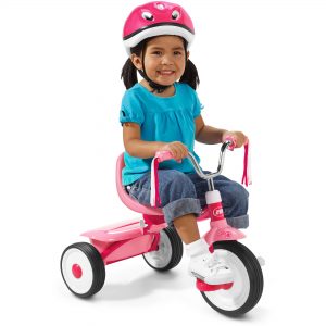 Toddler riding tricycle